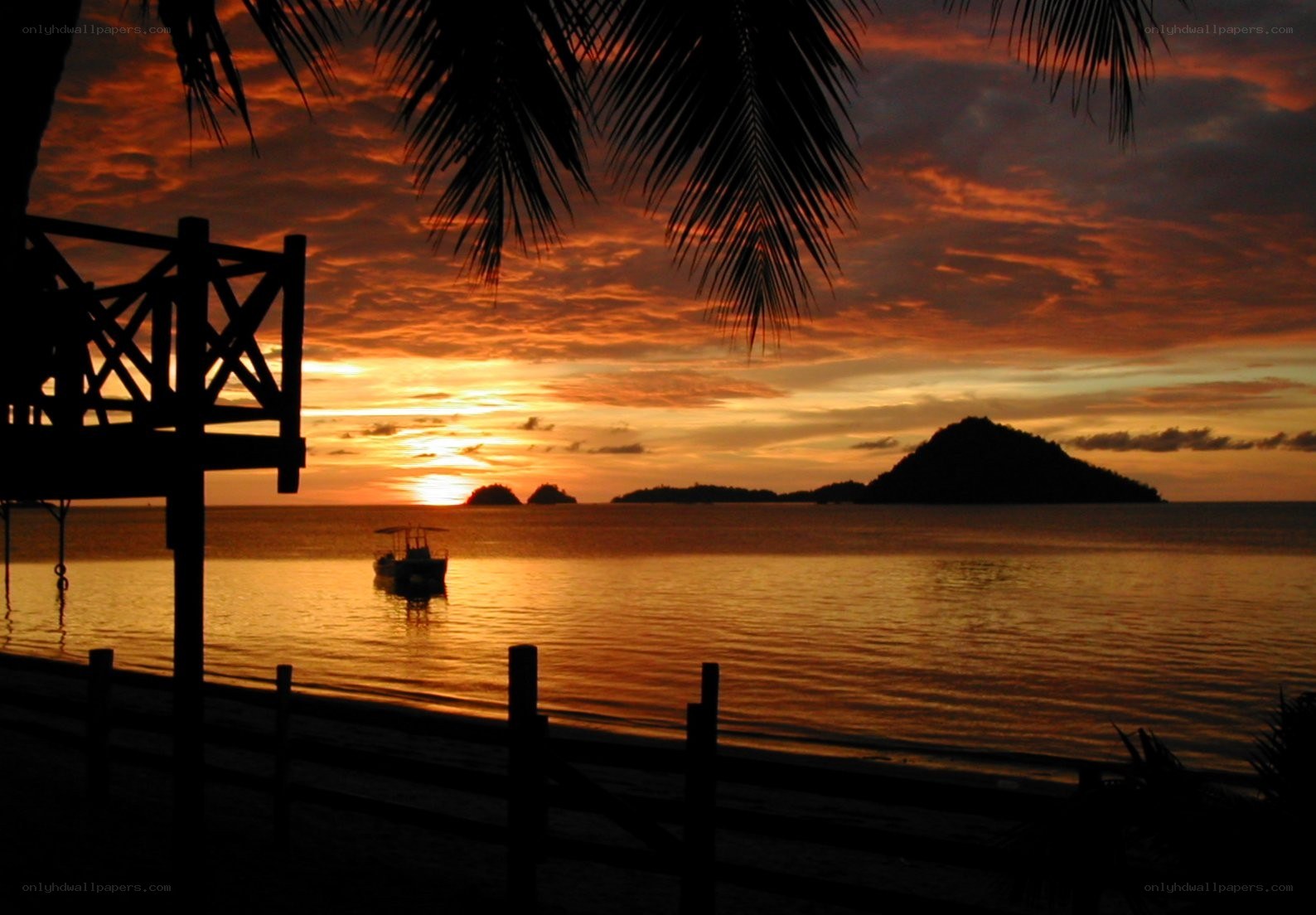 sunset over tropical island
