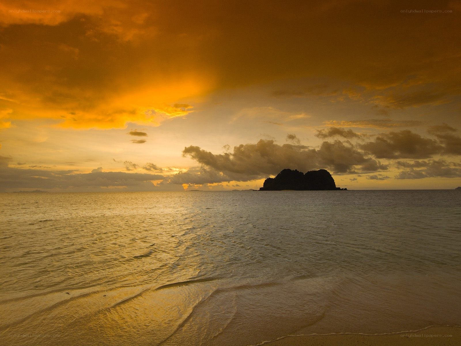 Sunset over tropical island