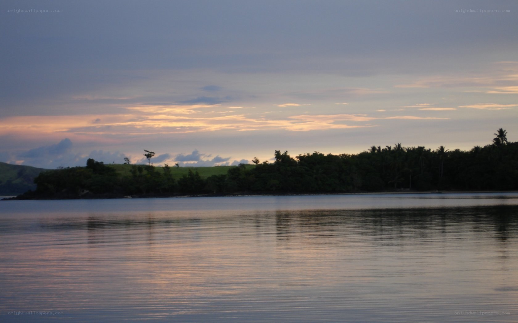 sunset over tropical island