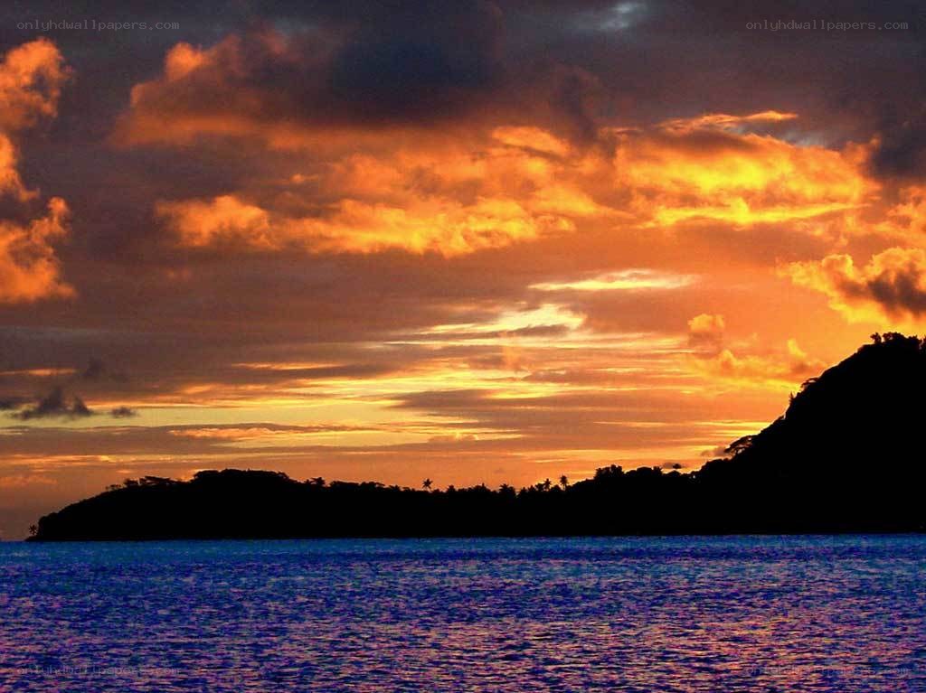 sunset over tropical island