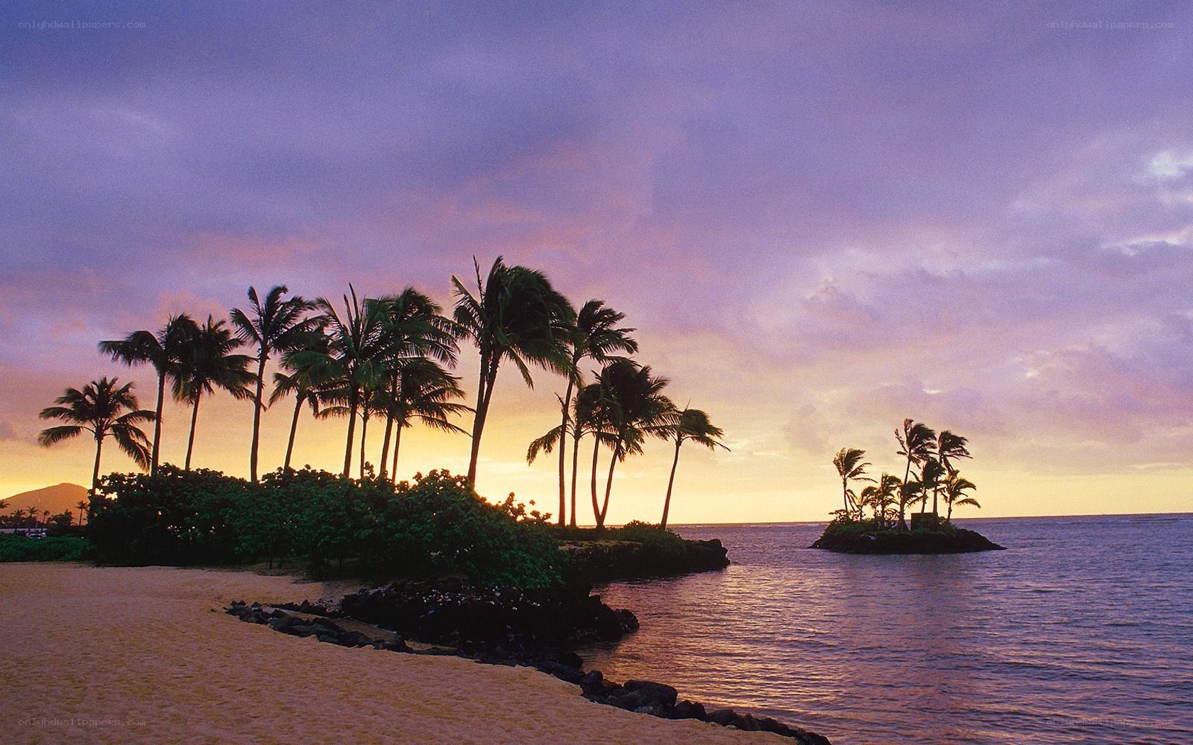 sunset over tropical island