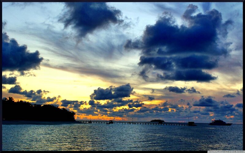 Sunset over Tropical Island — Blue, Dramatic