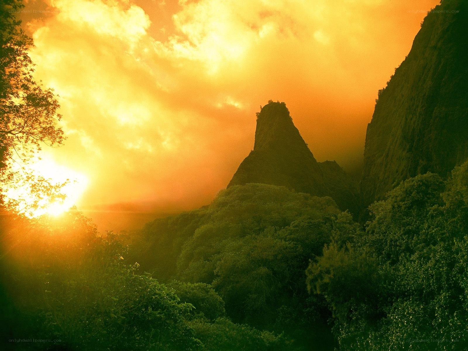 Sunset over tropical mountains