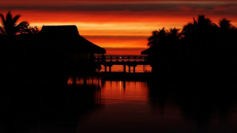 sunset over tropical resort