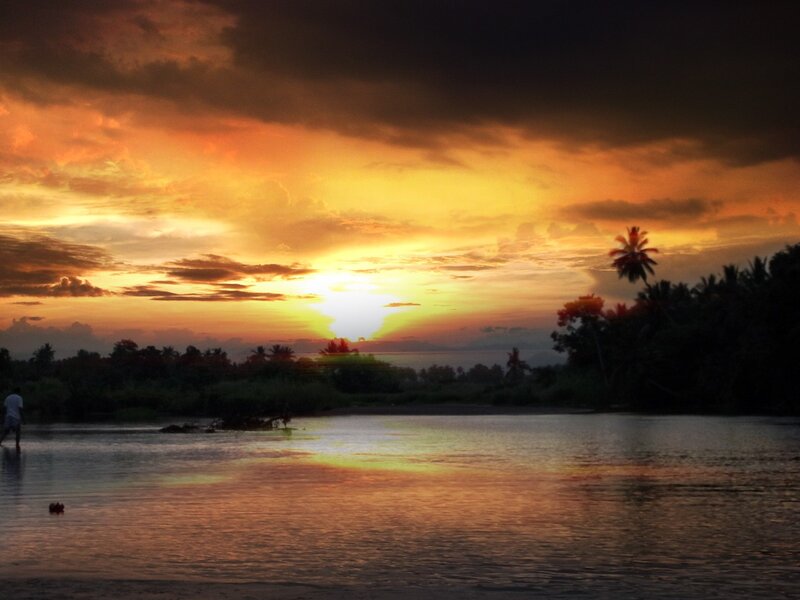 sunset over tropical river