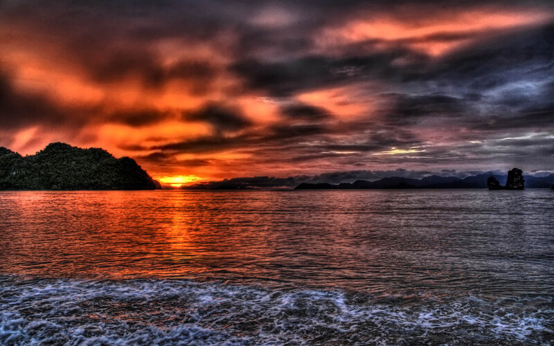 Sunset over Tropical Sea — Orange, Dramatic, Photograph, Island, Clouds, Mountains