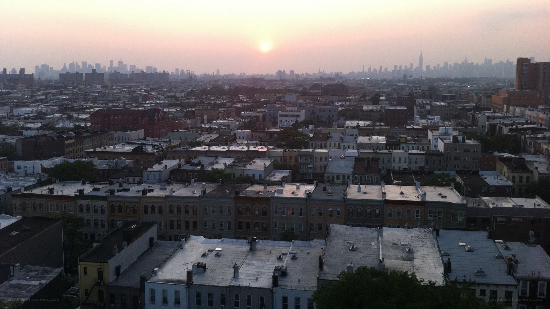 sunset over urban neighborhood