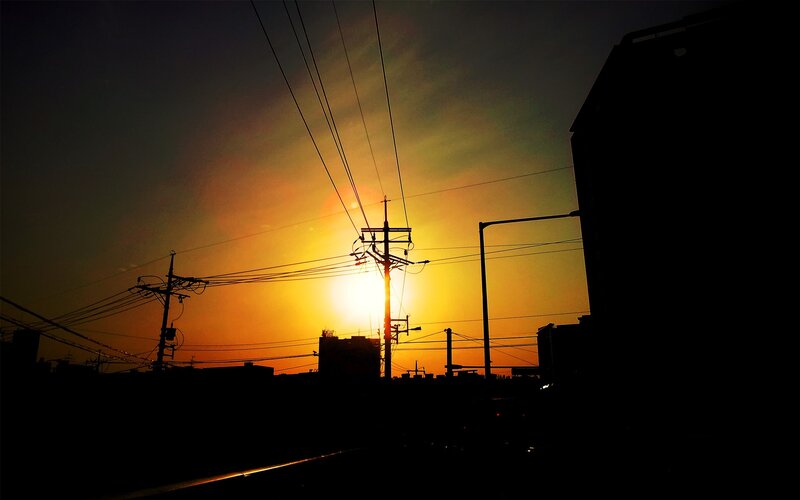 Sunset over urban silhouettes
