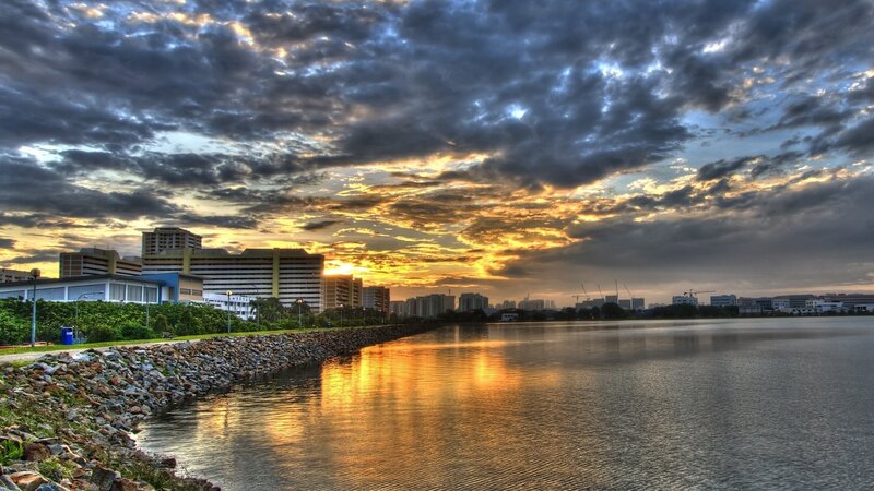 Sunset over urban waterfront