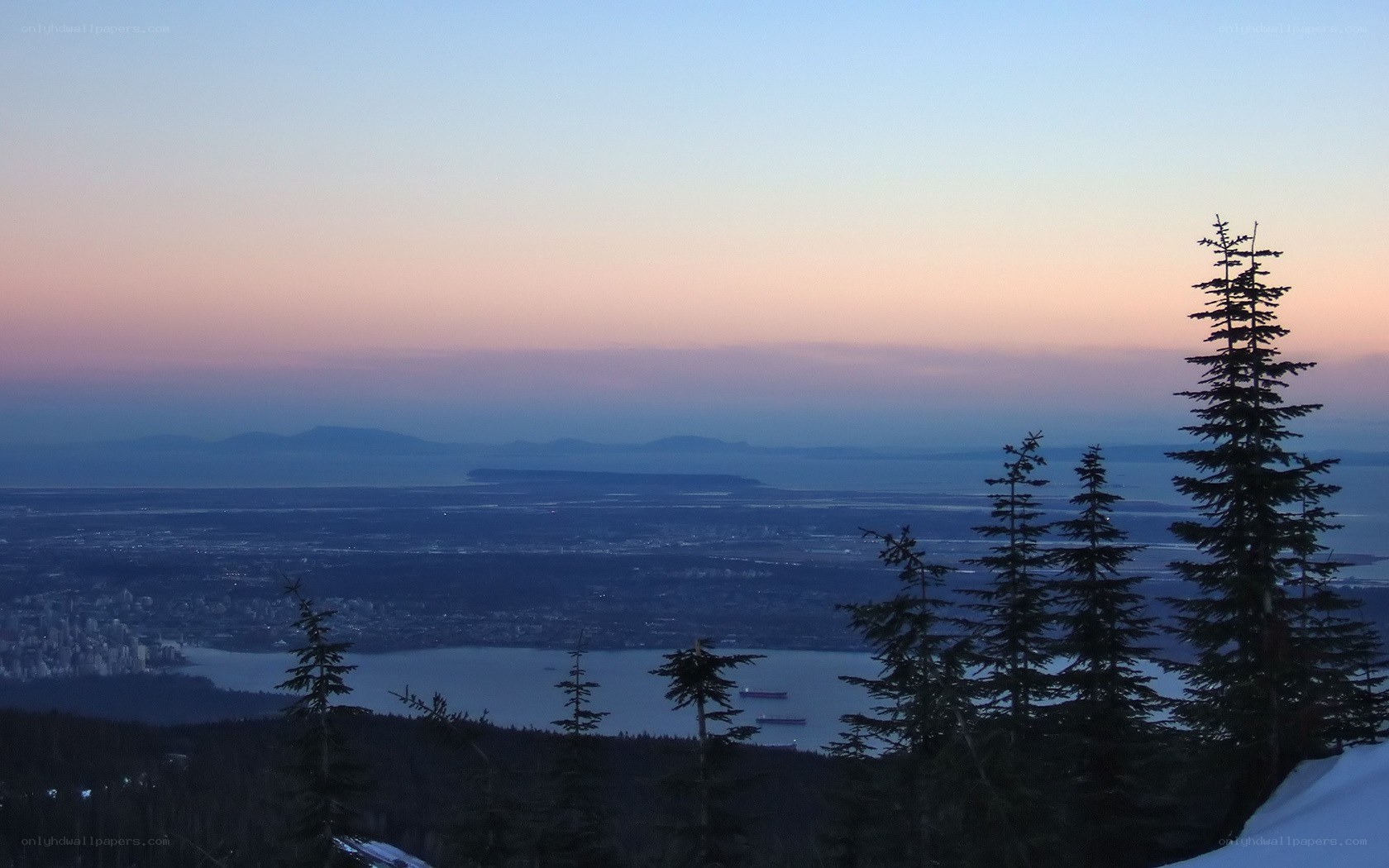 sunset over vancouver from grouse mountain