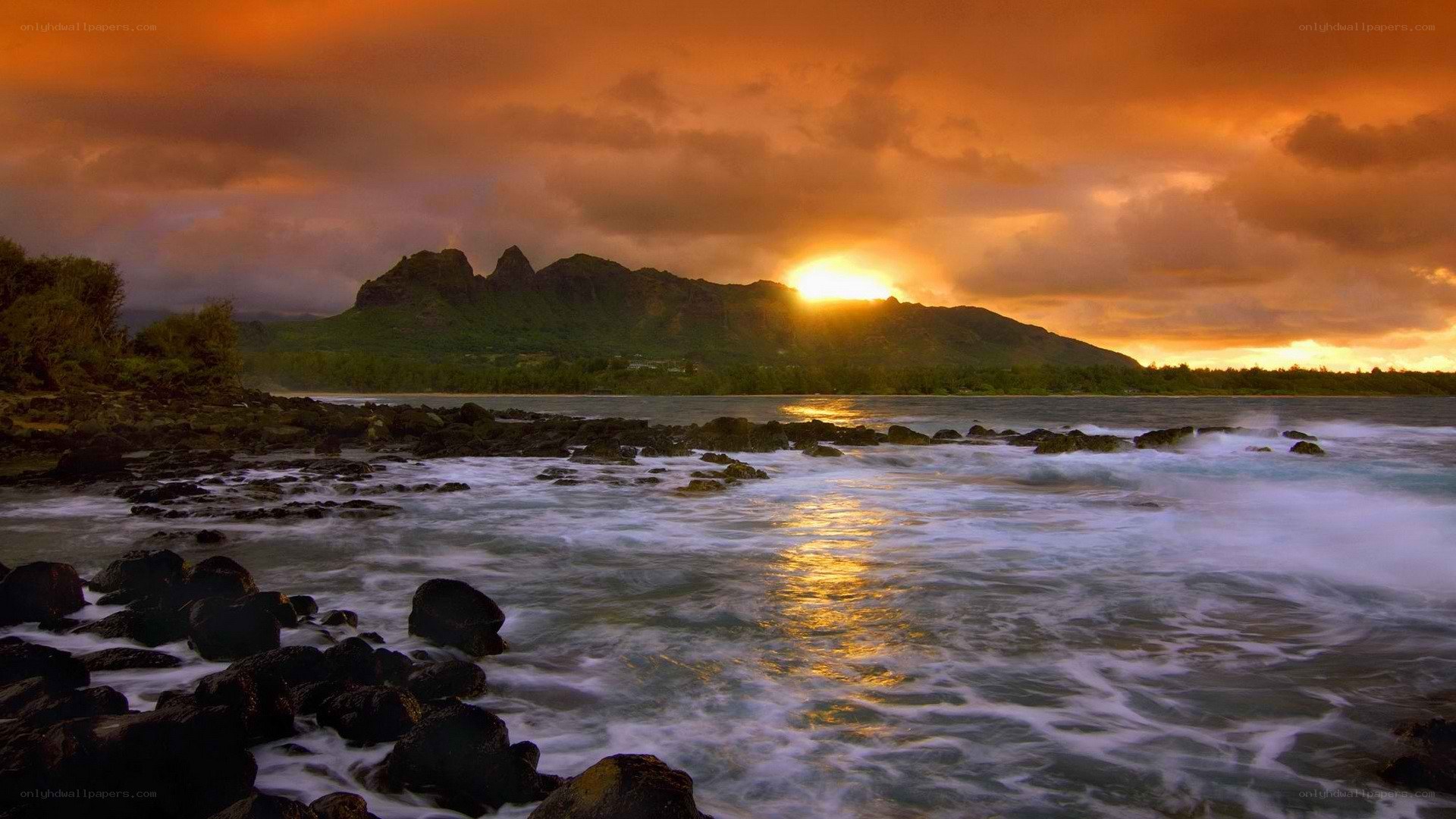 Sunset over volcanic island