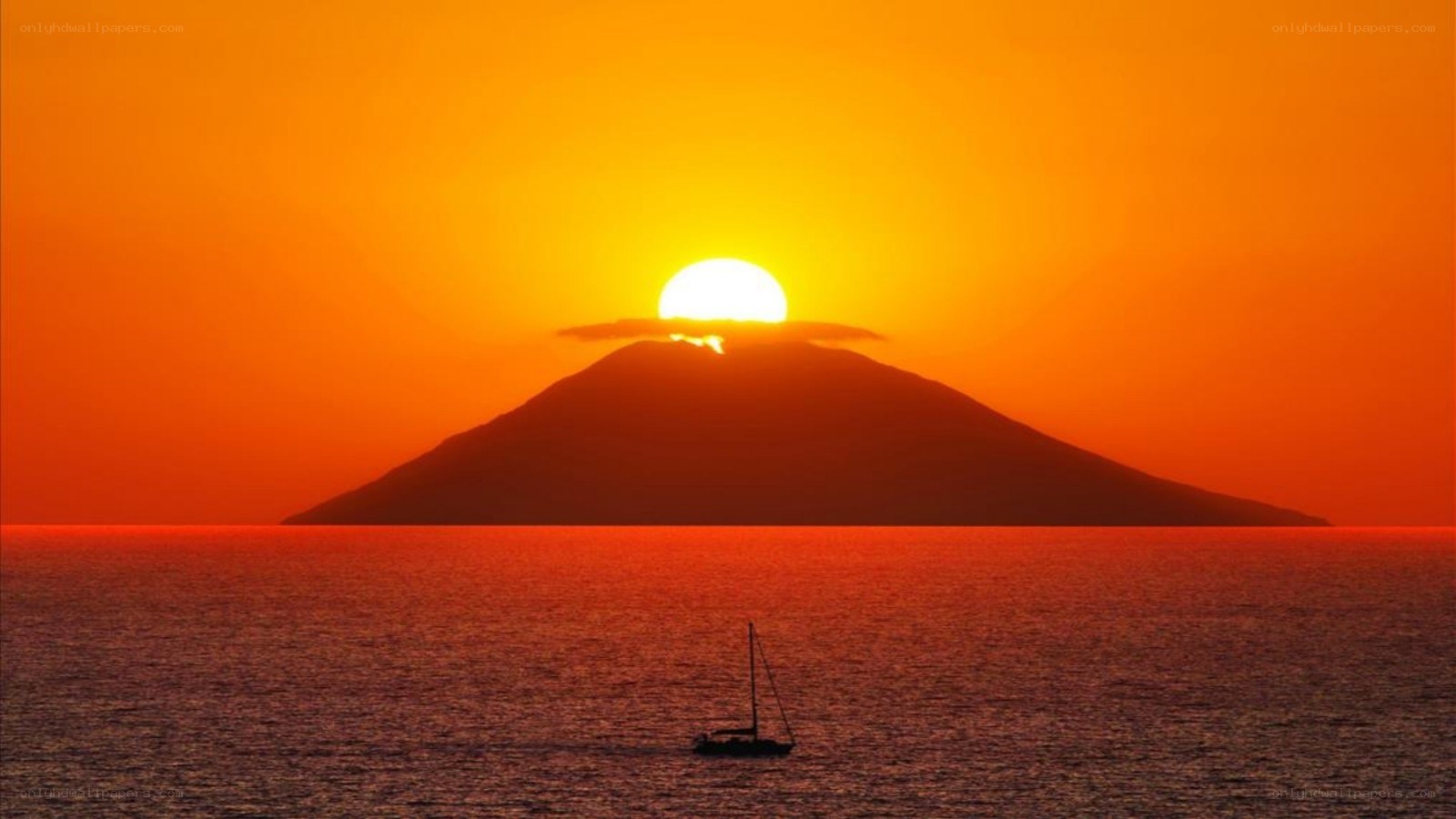 Sunset over volcanic island