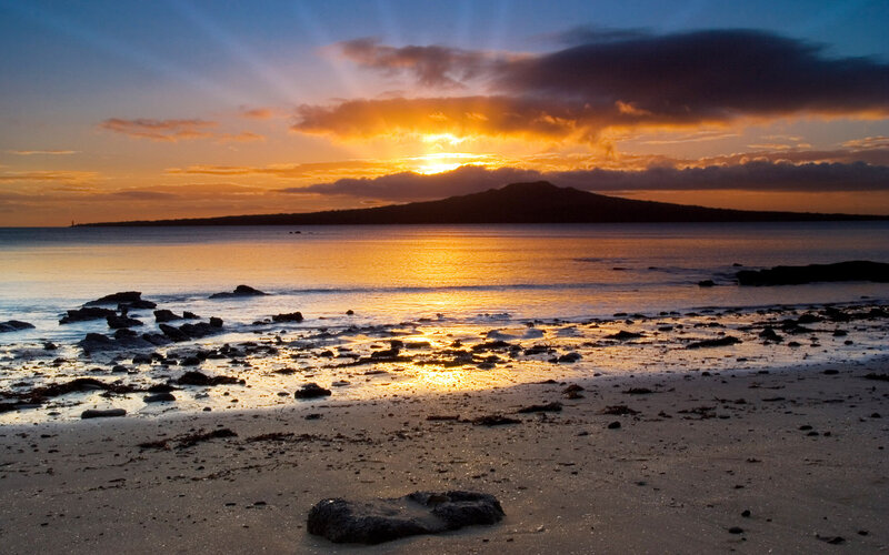 Sunset over Volcanic Island — Orange, Serene