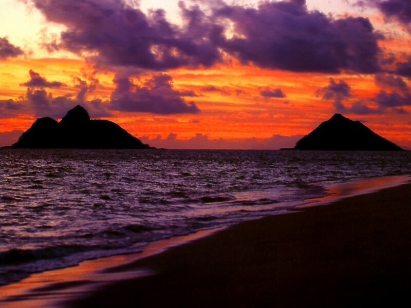 sunset over volcanic islands