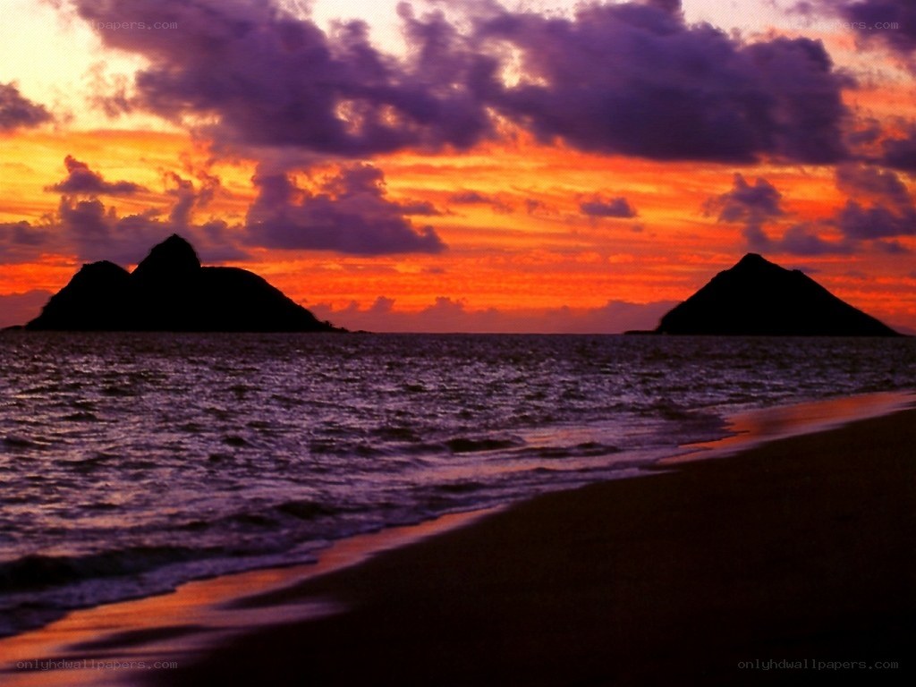 sunset over volcanic islands