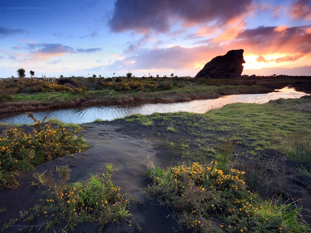 Sunset over volcanic landscape