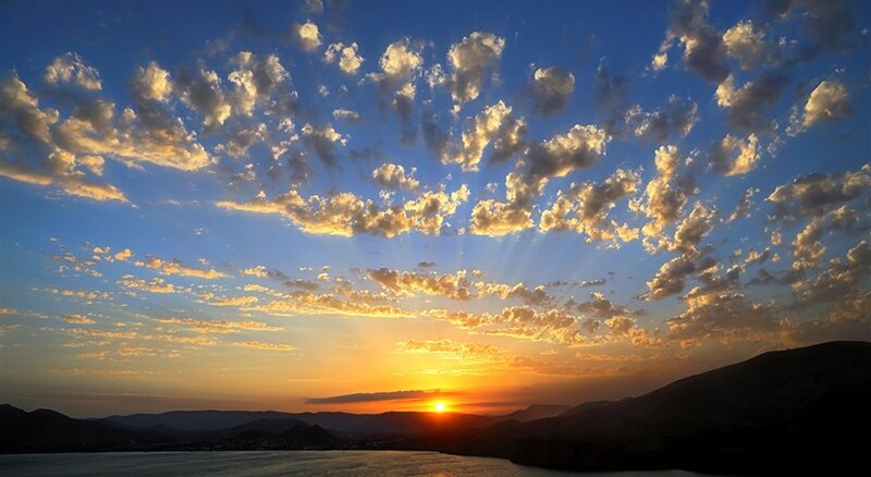Sunset over Water and Hills — Blue