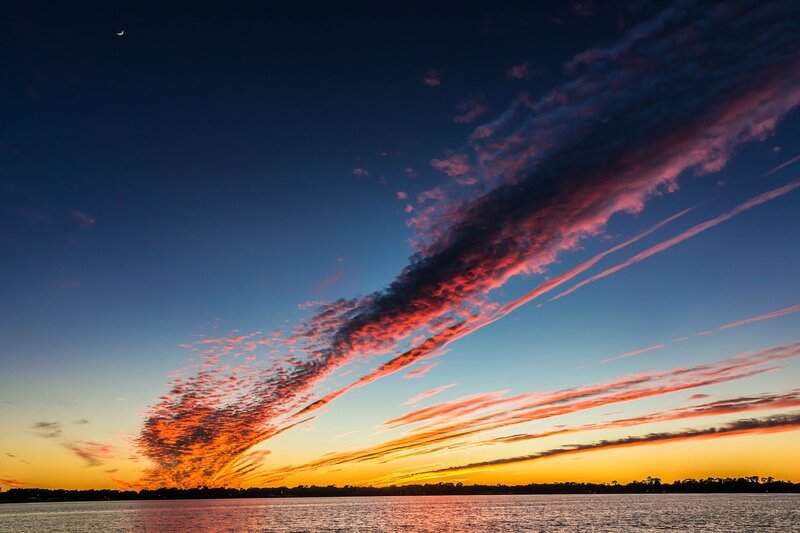 Sunset over Water — Blue, Dramatic, Photograph, Clouds, Moon