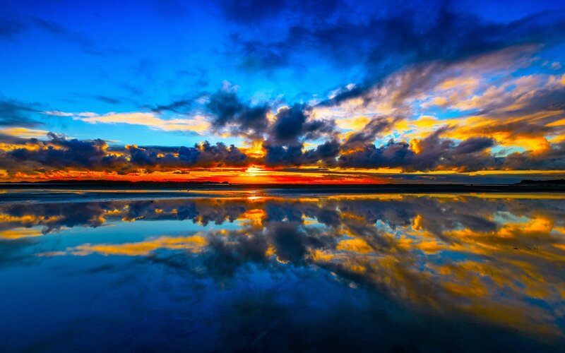 Sunset over Water — Blue, Dramatic, Photograph, Clouds, Reflection