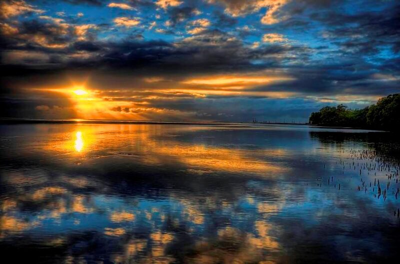 Sunset over Water — Blue, Dramatic, Photograph, Clouds, Sun