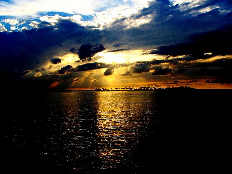 Sunset over Water — Blue, Dramatic, Photograph, Clouds, Sunlight