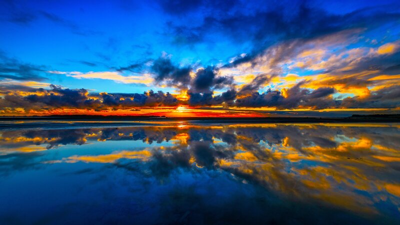 Sunset over Water — Blue, Dramatic, Photograph, Sky, Clouds, Reflection