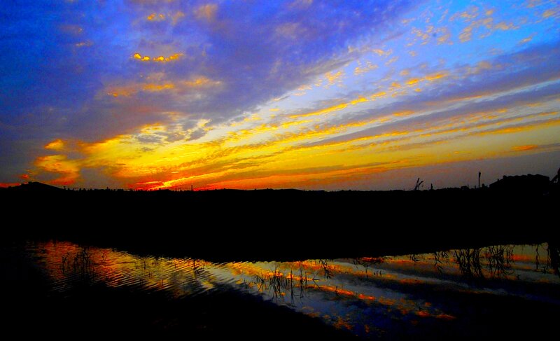 Sunset over Water — Blue, Dramatic, Photograph, Sky, Clouds, Silhouette