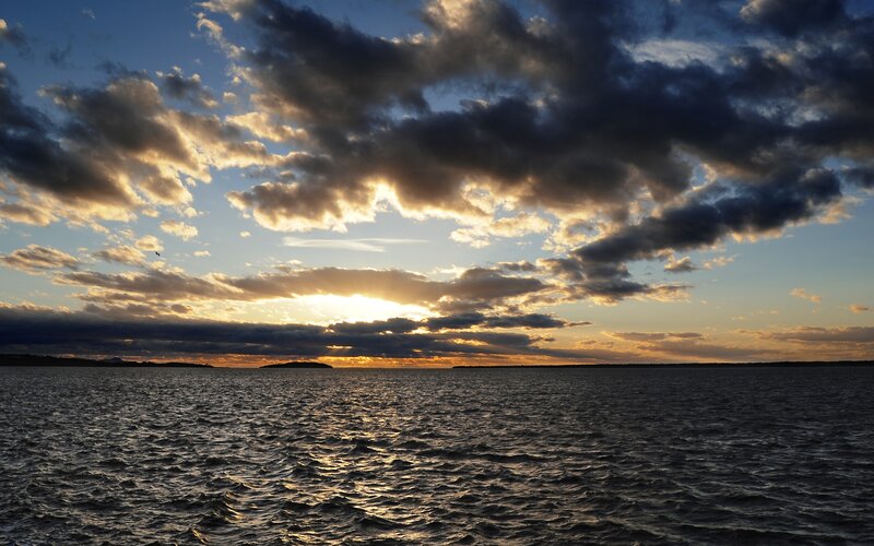 Sunset over Water — Blue, Dramatic, Photograph