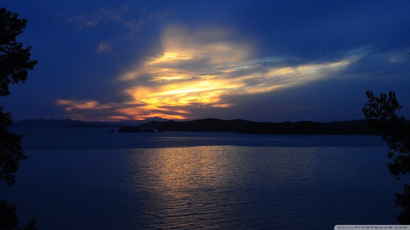 Sunset over Water — Blue, Serene, Photograph, Clouds, Mountains, Trees