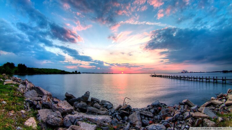 Sunset over Water — Blue, Serene, Photograph, Pier, Rocks