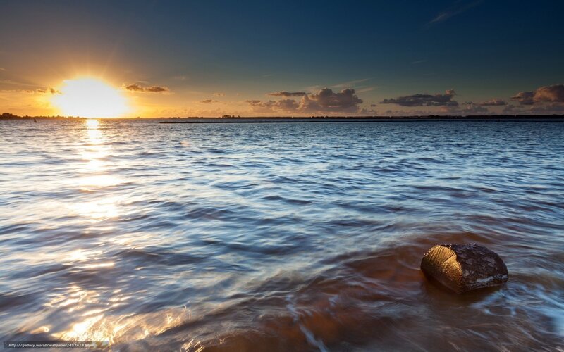 Sunset over Water — Blue, Serene, Photograph, Sun, Clouds, Rock