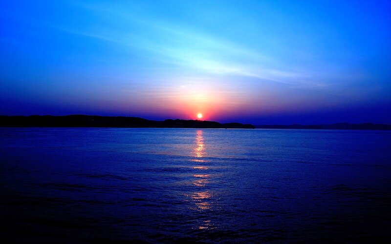 Sunset over Water — Blue, Serene, Photograph, Sun, Sky
