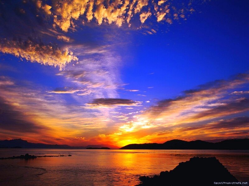 Sunset over Water — Clouds