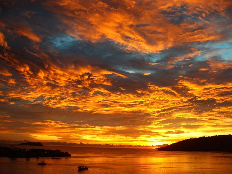 Sunset over Water — Orange, Dramatic, Photograph, Clouds, Boats