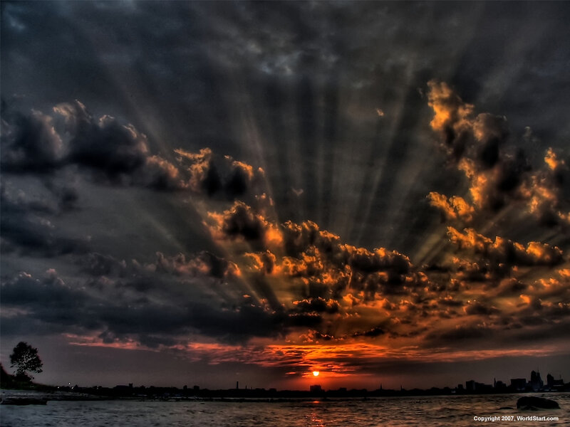 Sunset over Water — Orange, Dramatic, Photograph, Clouds, City Skyline, Tree