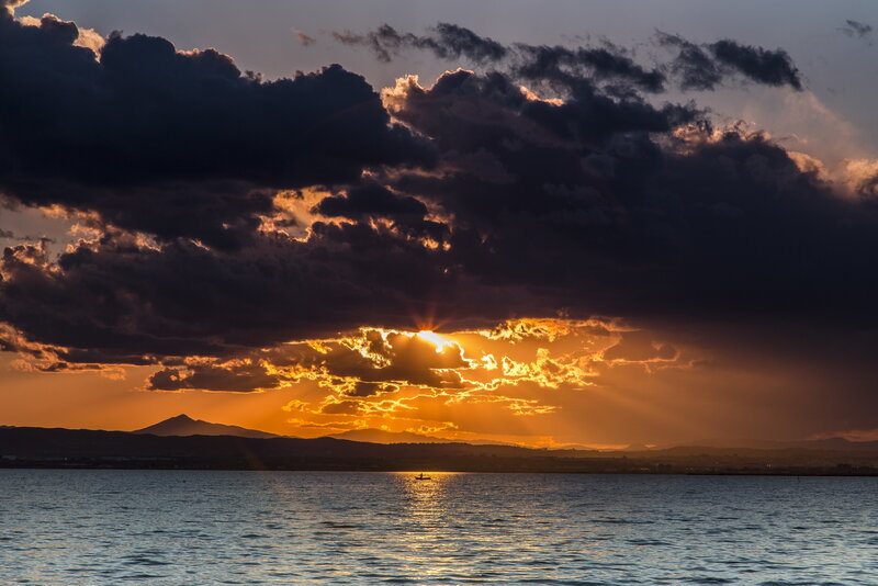 Sunset over Water — Orange, Dramatic, Photograph, Clouds, Mountain