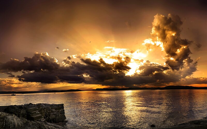 Sunset over Water — Orange, Dramatic, Photograph, Clouds, Rocks