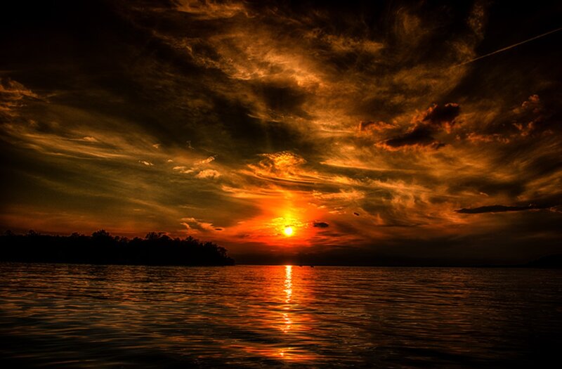 Sunset over Water — Orange, Dramatic, Photograph, Clouds, Sun, Silhouette