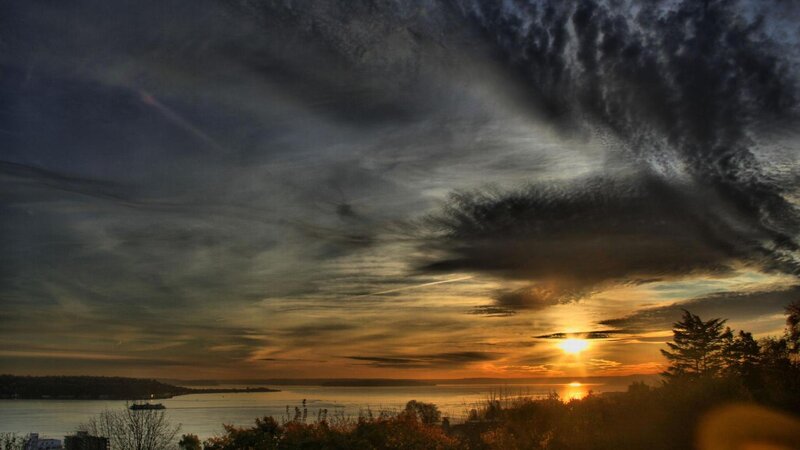 Sunset over Water — Orange, Dramatic, Photograph, Clouds, Trees, Boat