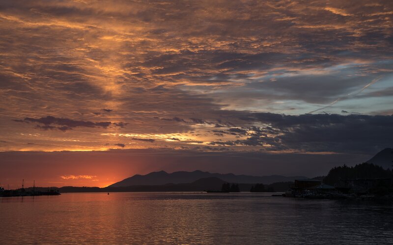 Sunset over Water — Orange, Dramatic, Photograph, Mountains, Boats