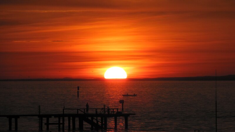 Sunset over Water — Orange, Dramatic, Photograph, Pier, Boat