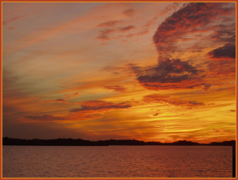 Sunset over Water — Orange, Dramatic, Photograph, Sky, Clouds
