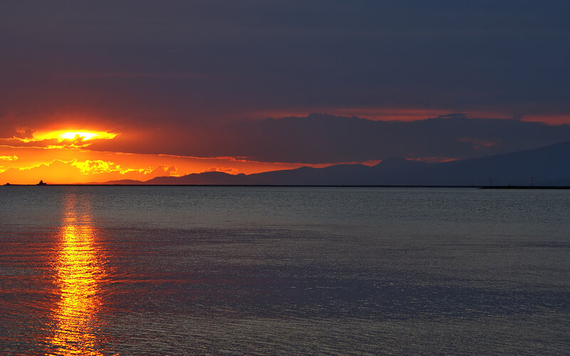 Sunset over Water — Orange, Dramatic, Photograph, Sun, Mountains, Ship