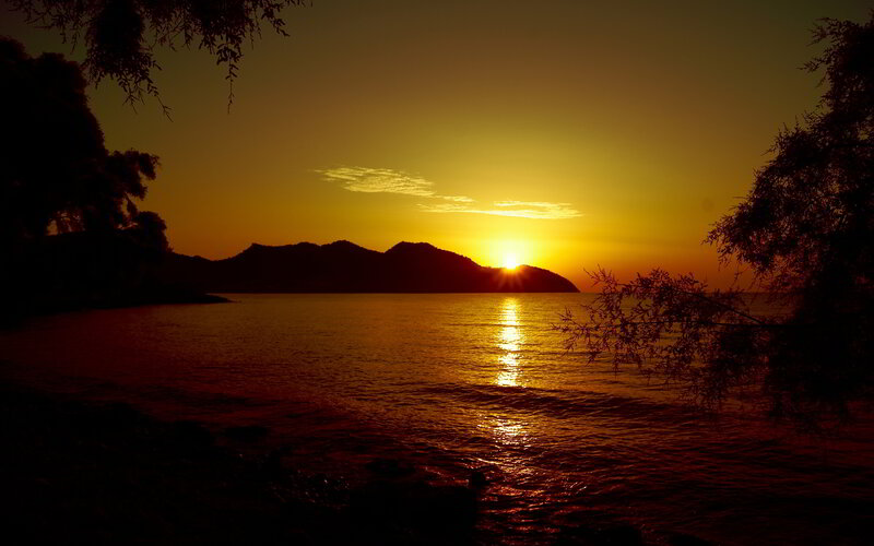 Sunset over Water — Orange, Serene, Photograph, Mountain