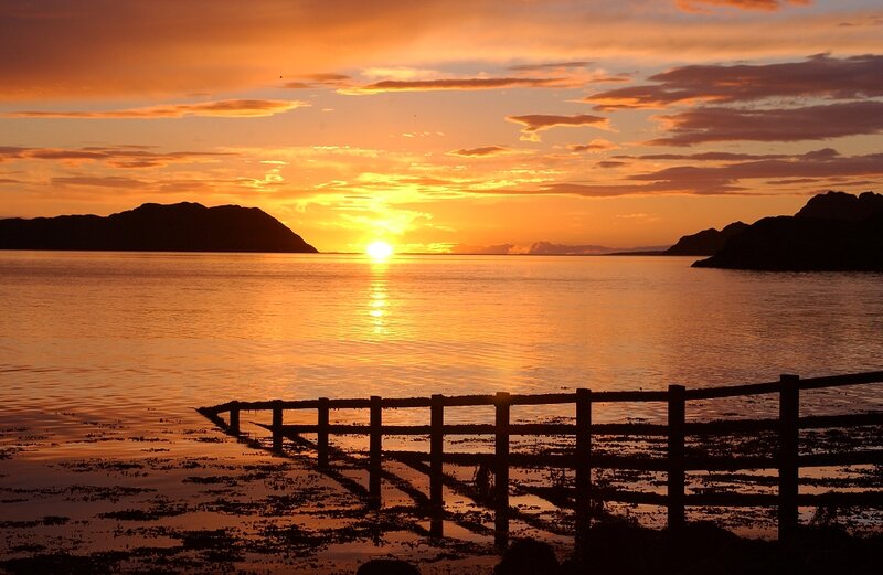 Sunset over Water — Orange, Serene, Photograph, Mountains, Fence