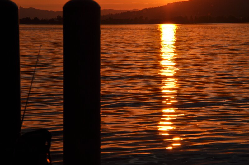 Sunset over Water — Orange, Serene, Photograph, Pier Post
