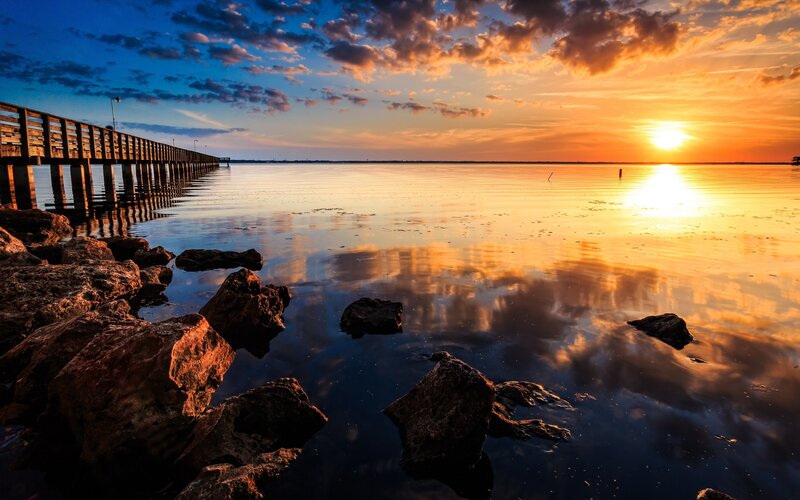 Sunset over Water — Orange, Serene, Photograph, Pier