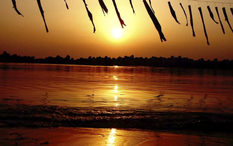 Sunset over Water — Orange, Serene, Photograph, Silhouettes