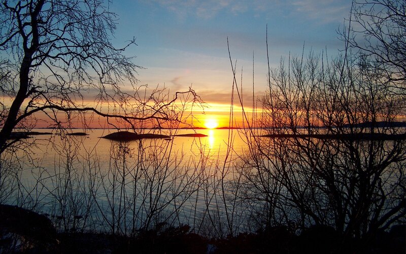 Sunset over Water — Orange, Serene, Photograph, Trees, Islands, Sky, Blue, Black