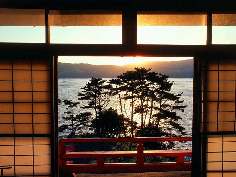 Sunset over Water — Orange, Serene, Photograph, Trees, Mountains, Rail